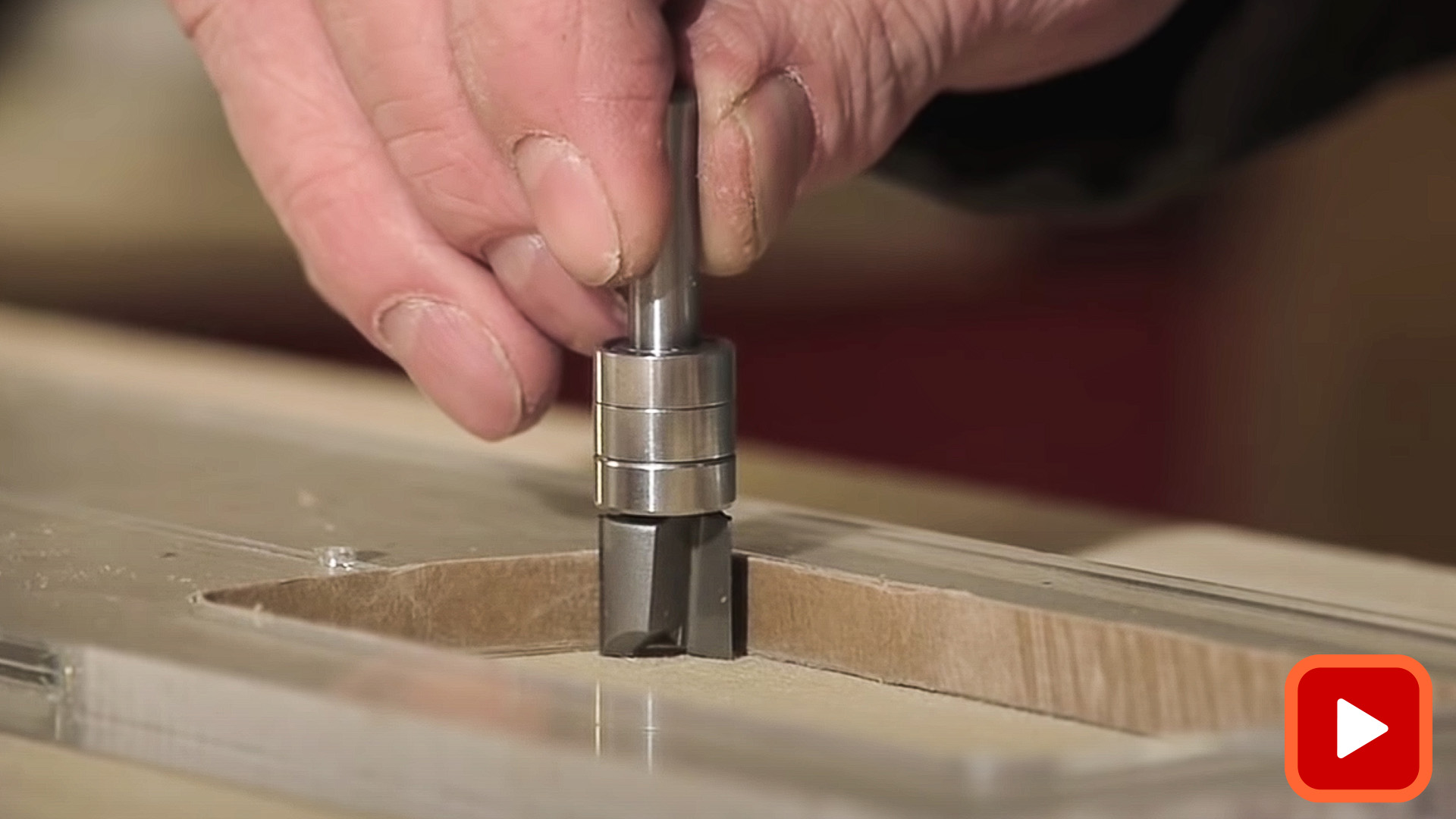Router bit in a routing template