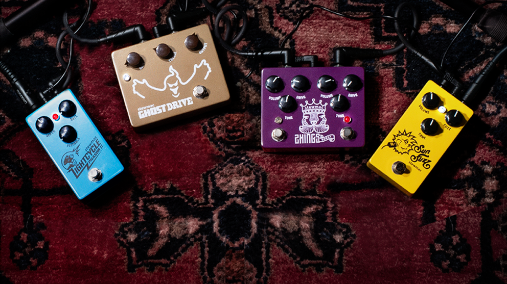 Four guitar effects pedals in the studio.