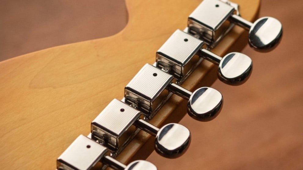 Vintage style Golden Age tuning machines on a Stratocaster guitar.