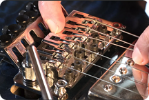 dedo demostrando entonación de guitarra