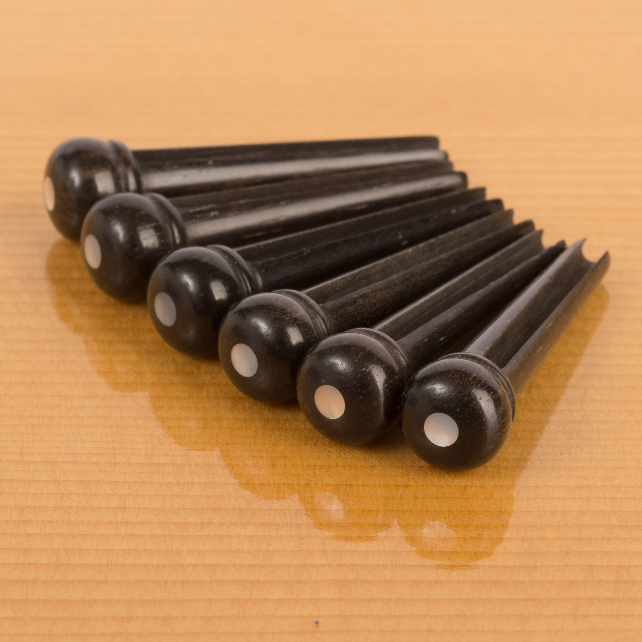 Waverly Ebony Bridge Pins with Shell Inlay, Slotted with pearl dot, set of 6 Waverly Ebony Bridge Pins with Shell Inlay, Slotted with pearl dot, set of 6