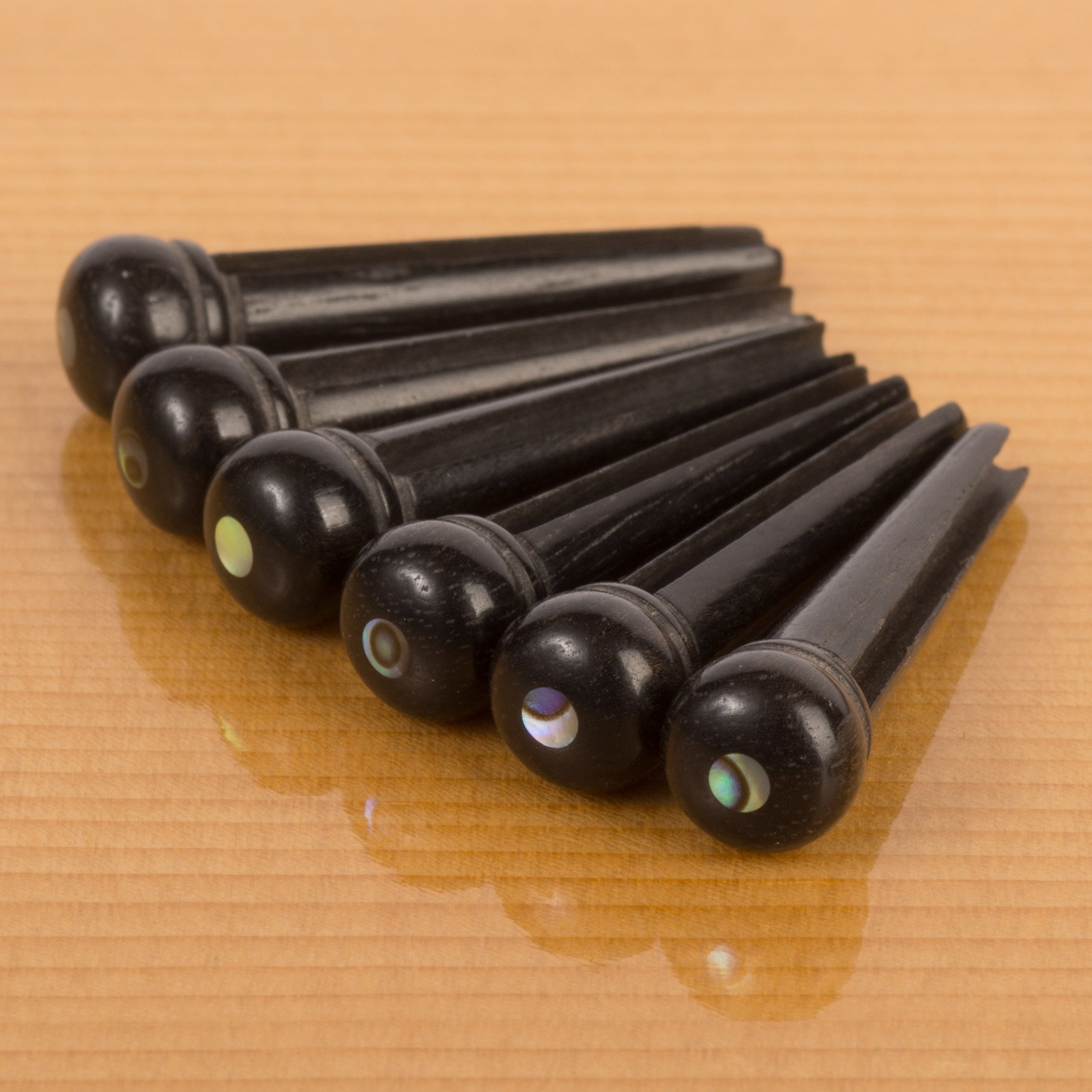 Waverly Ebony Bridge Pins with Shell Inlay, Slotted with abalone dot, set of 6 Waverly Ebony Bridge Pins with Shell Inlay, Slotted with abalone dot, set of 6