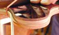 Heating the binding with a heat gun