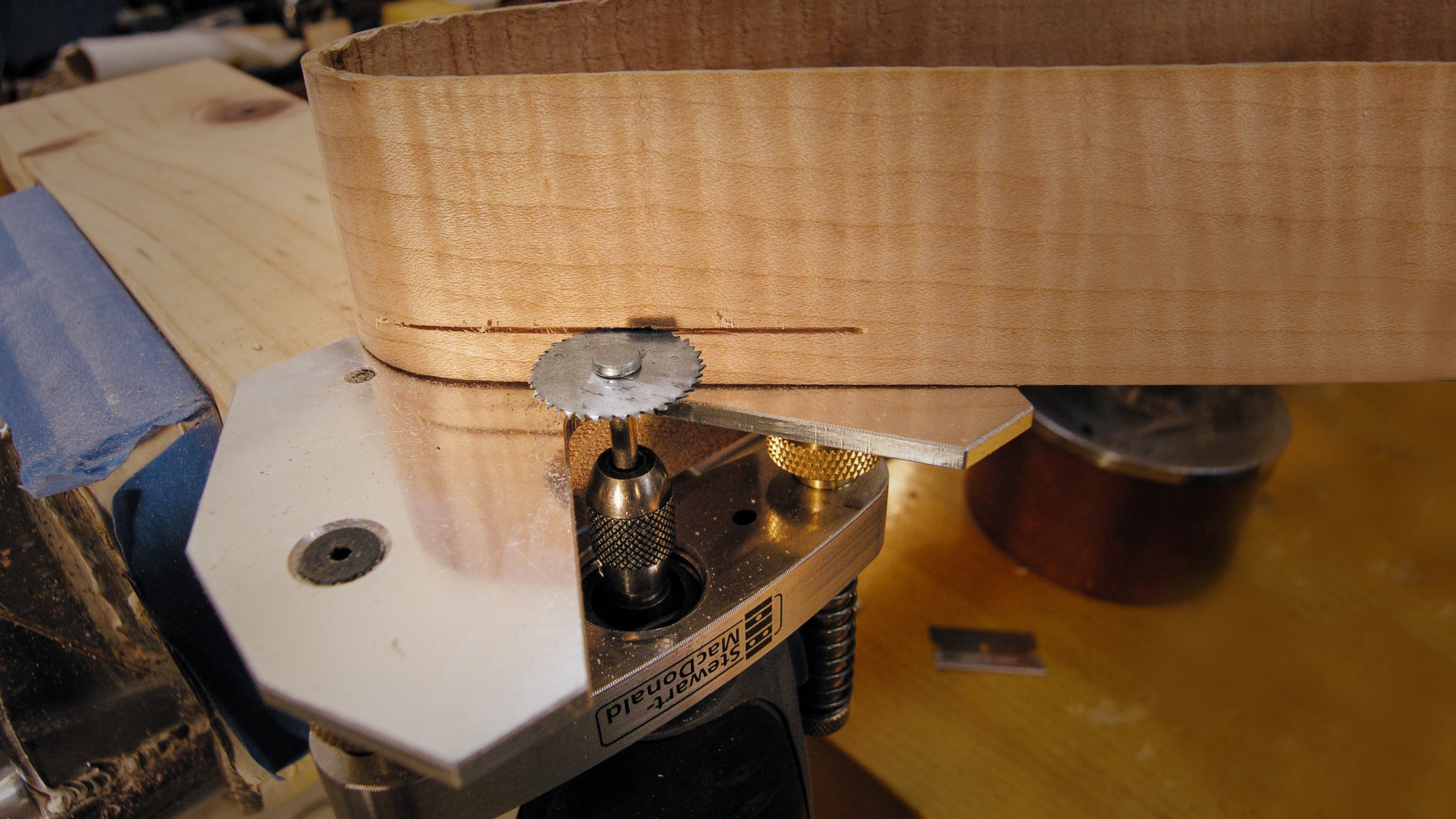 Cut binding strips with an <em>upside down</em> Dremel tool