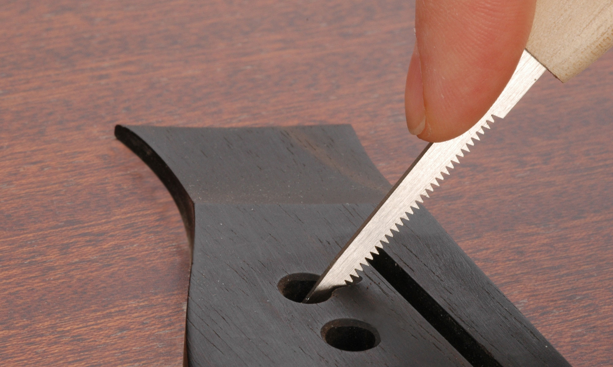 Bridge Pin Hole Slotting Bridge Pin Hole Slotting