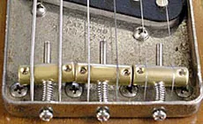 Clean up your old electric guitar saddles - StewMac