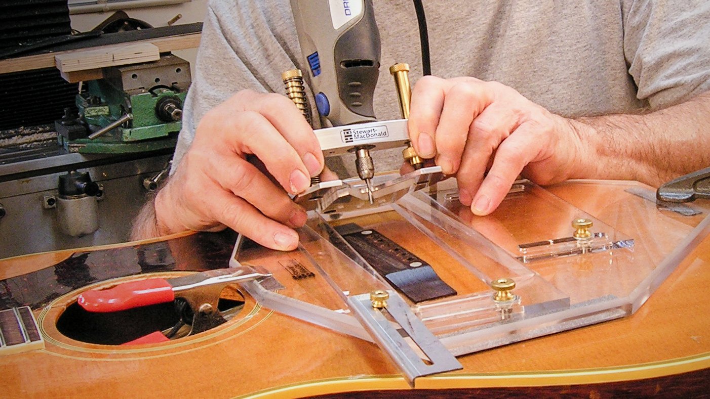 Finding the right location for a guitar's saddle slot Finding the right location for a guitar's saddle slot