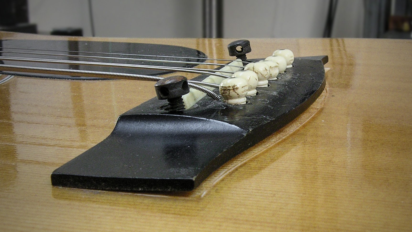 Fixing a loose bridge on a yard sale special