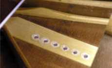 Repaired bridge pin holes