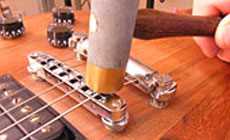 Photo: fret hammer making string notches