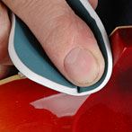 Buff out guitar finish repairs
