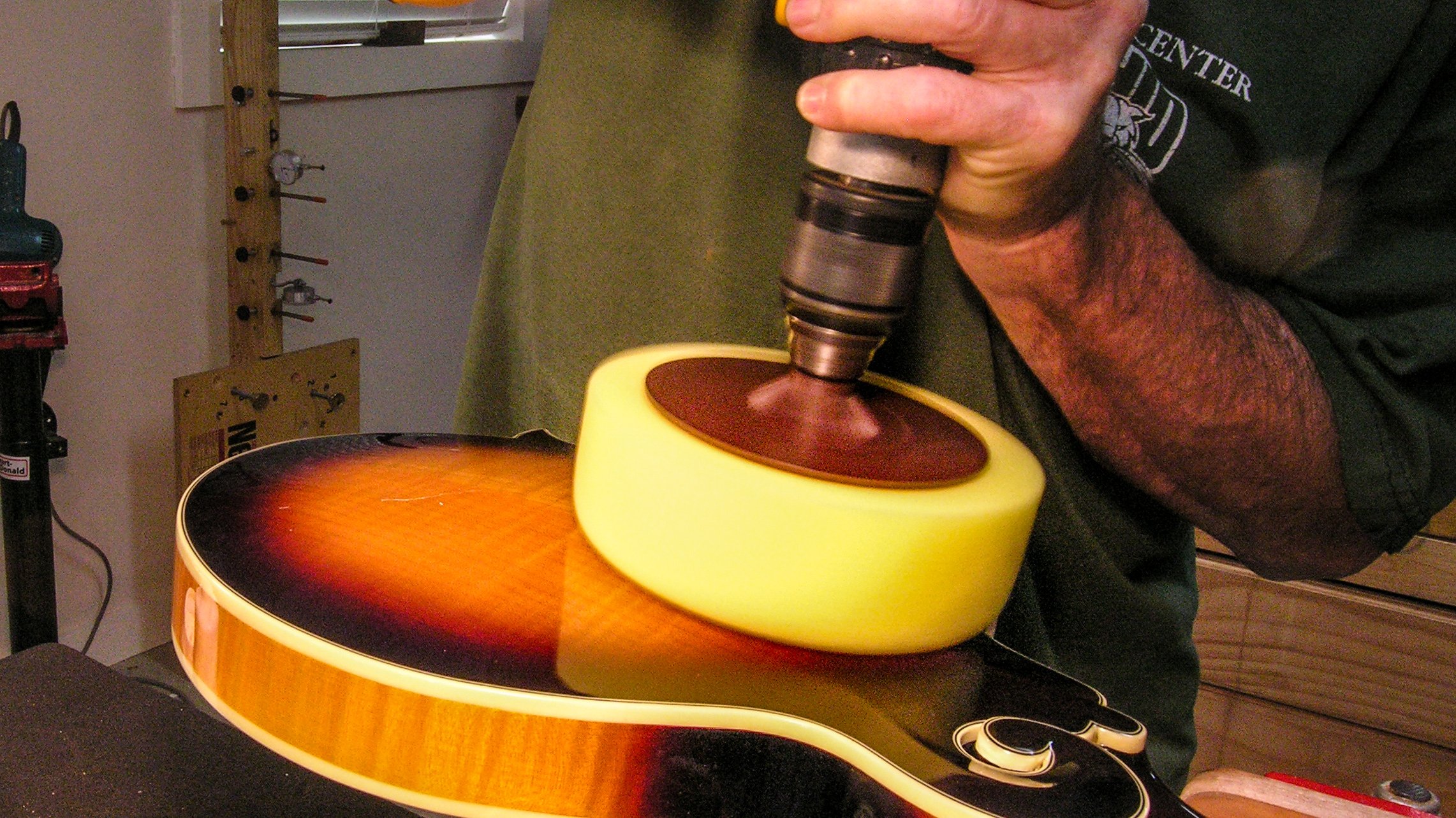Using a foam buffer in a hand drill on Junior Brown Guit-Steels<sup>®</sup> Using a foam buffer in a hand drill on Junior Brown Guit-Steels<sup>®</sup>