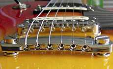 Top-wrapped strings