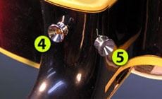 Strap button positions on the guitar neck