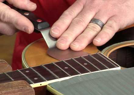 Loosen the fretboard extension