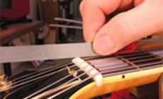 Filing a string slot