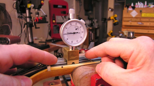 Putting the new Nut Slotting Gauge to work on a "burn victim" guitar Putting the new Nut Slotting Gauge to work on a "burn victim" guitar
