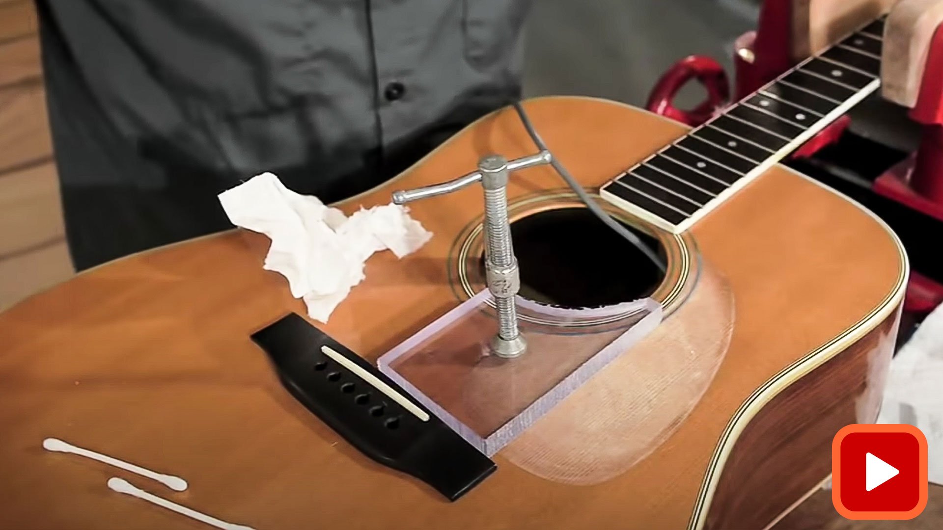 Acrylic caul and clamp regluing cracked guitar top 