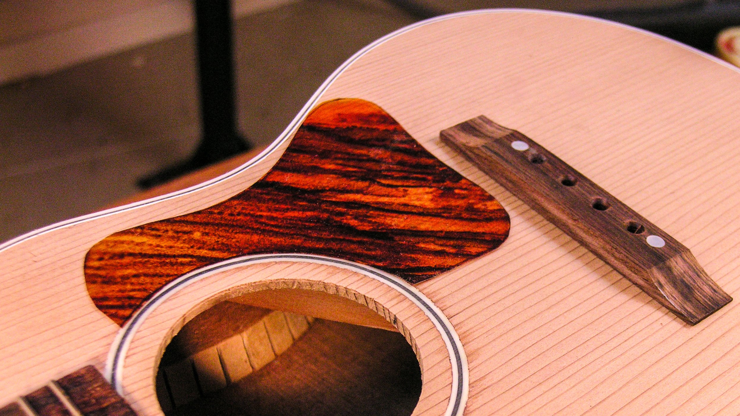 Making a custom fire stripe pickguard to fit a baby guitar!