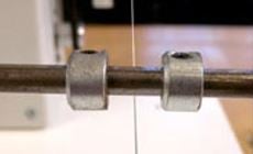 Traverse limiter and pickup wire