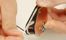 Wrapping the pickup with string