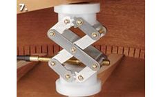 Press the brace into position and clean up glue squeeze-out