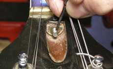 Cleaning the truss rod threads