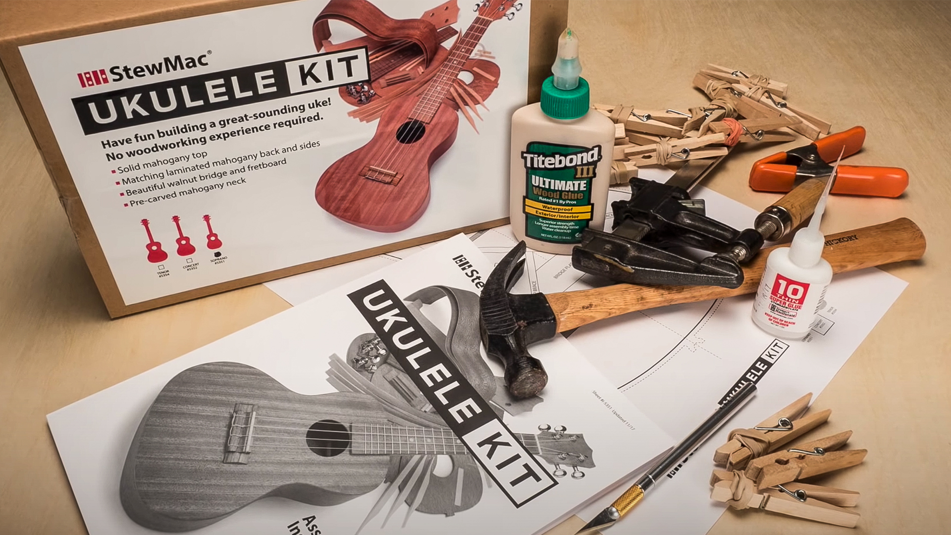 StewMac Ukulele Kit unboxed with tools on workbench