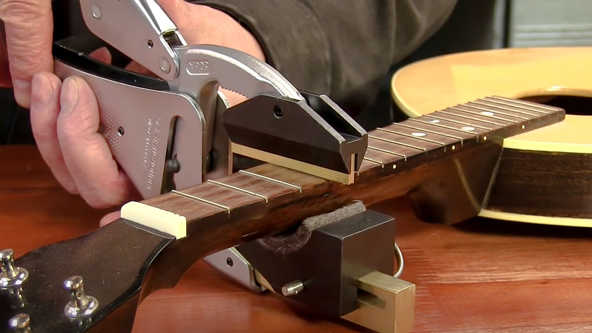 Fast, consistent fret installation with Jaws