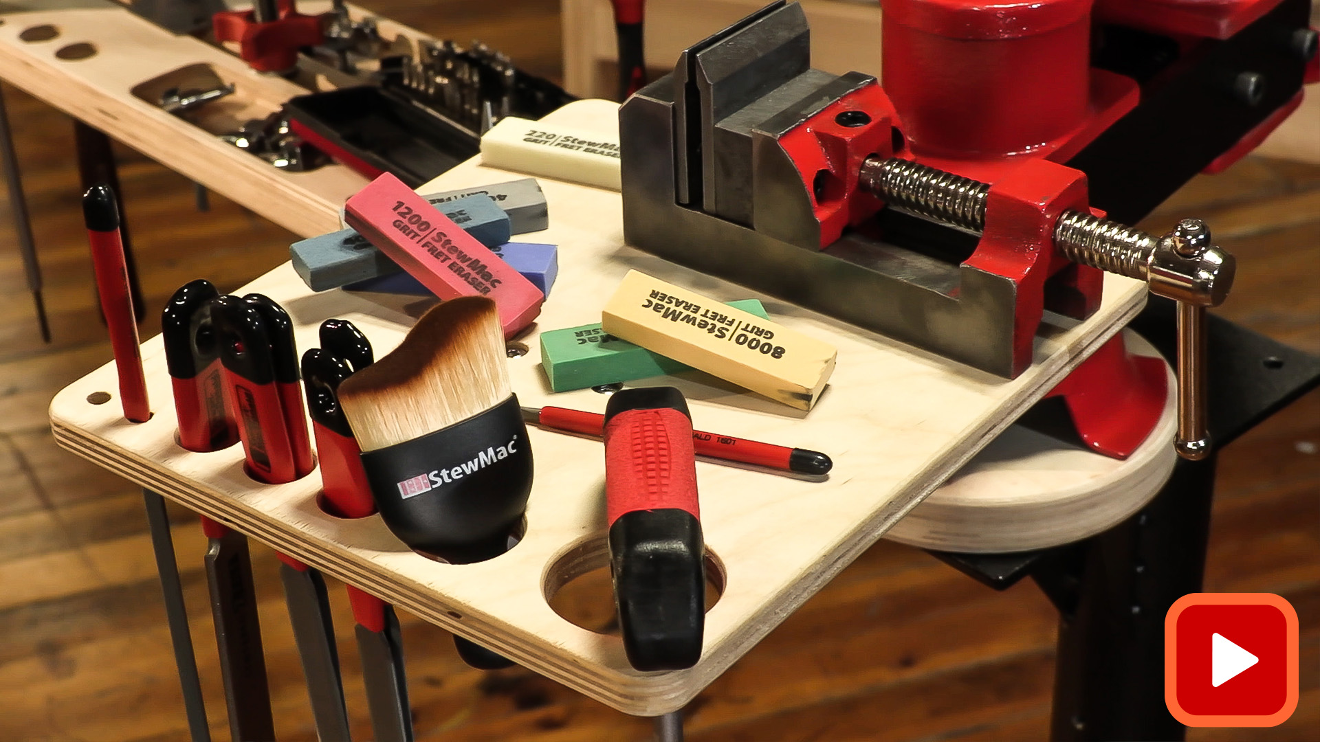 Vise tool table filled with organized files and tools