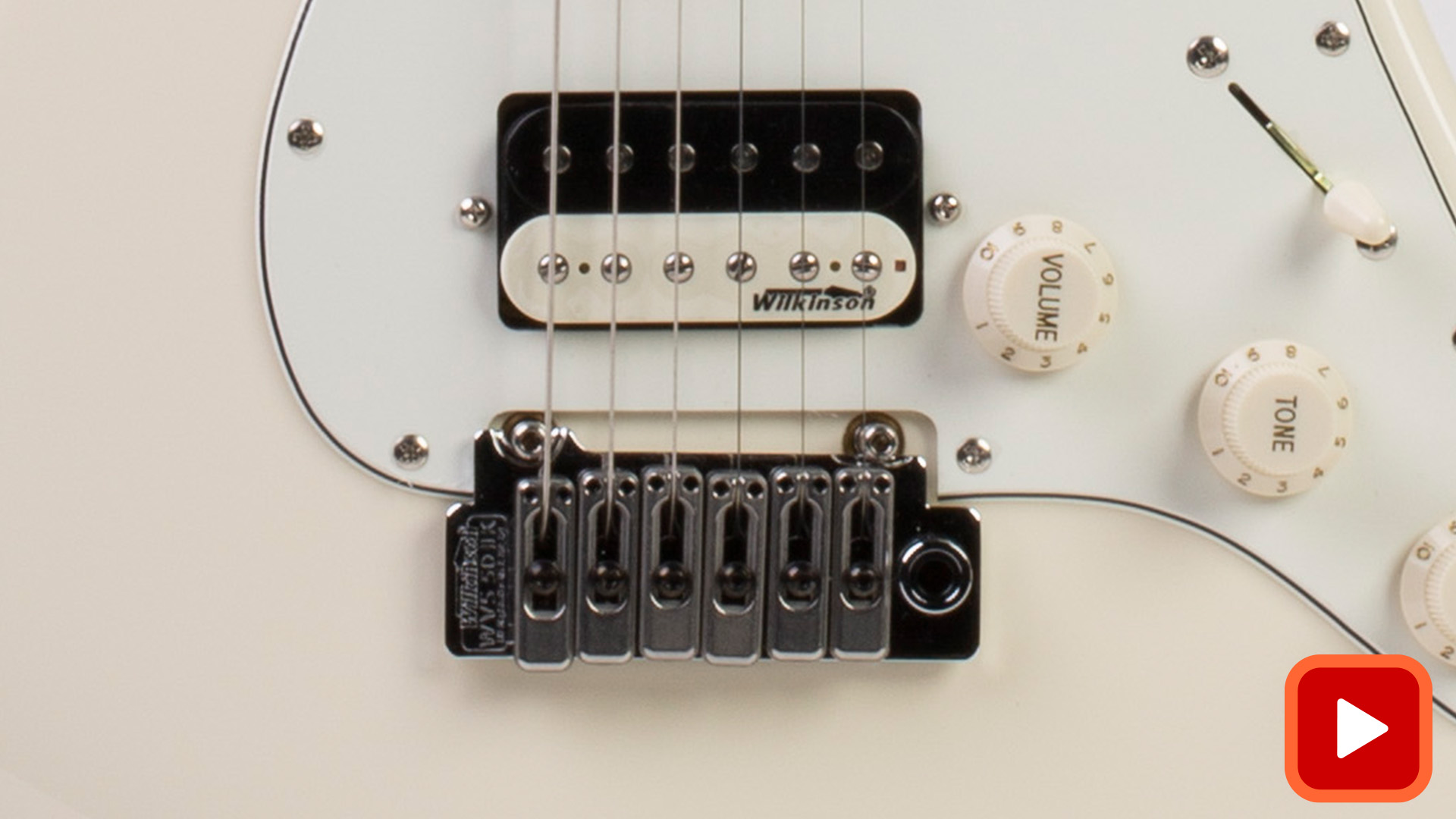 Two point Wilkinson tremolo bridge on a white guitar