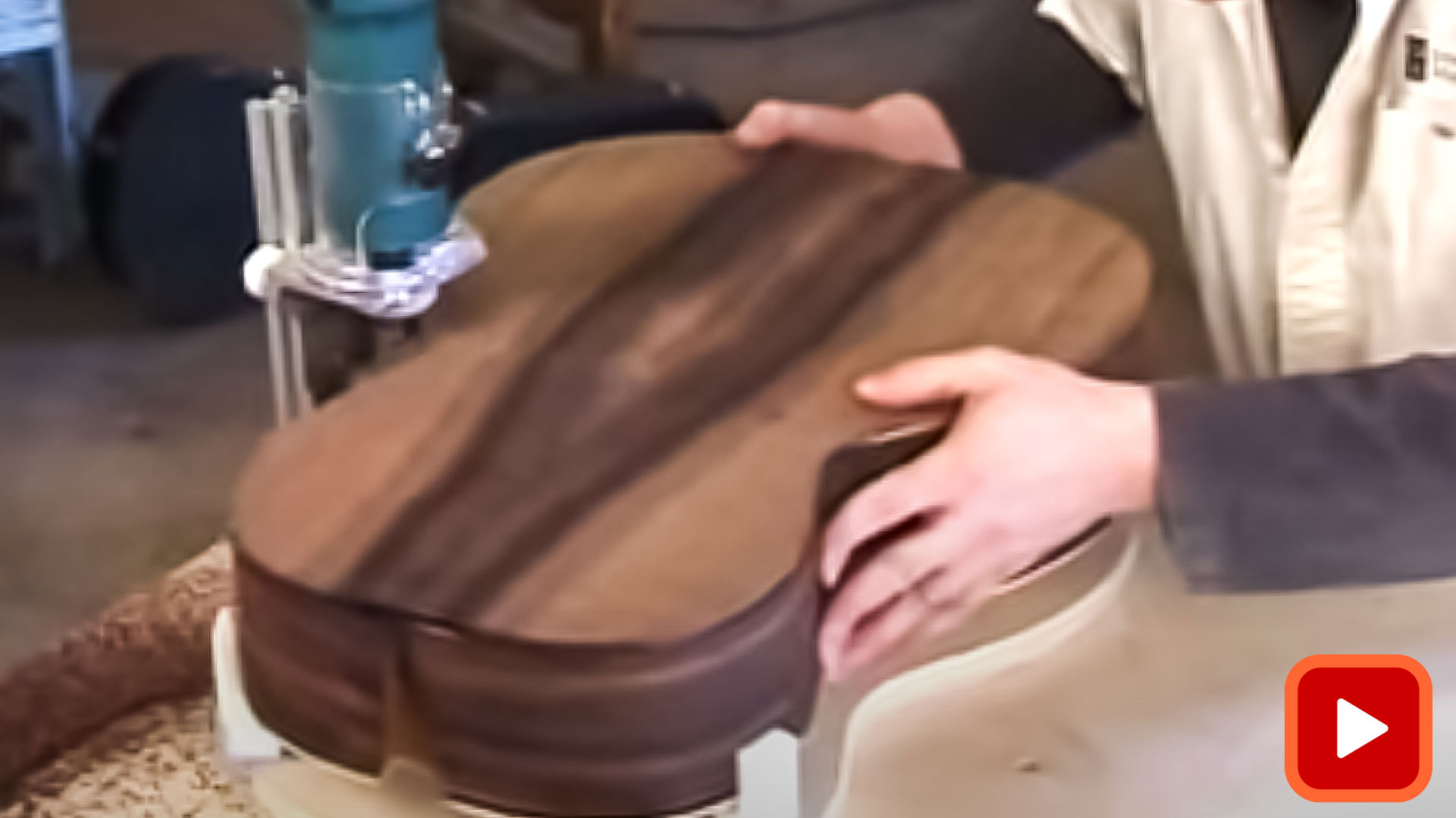 Binding channel being cut in acoustic guitar with True Channel binding jig 