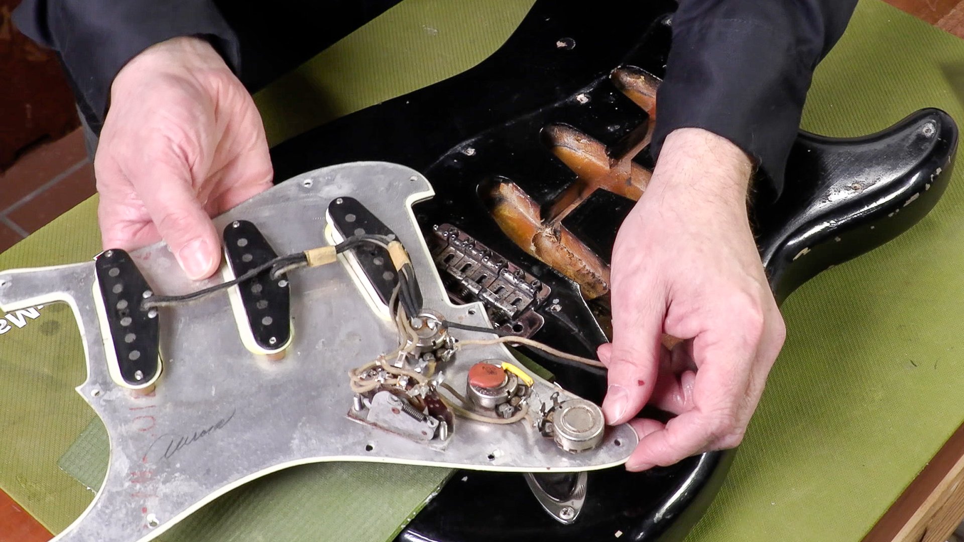 Is this '62 Strat genuine and all original?