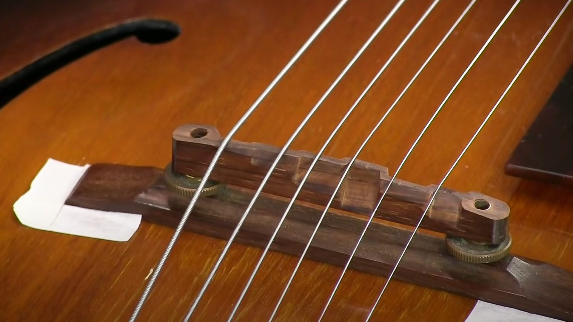 acoustic guitar string spacing at bridge
