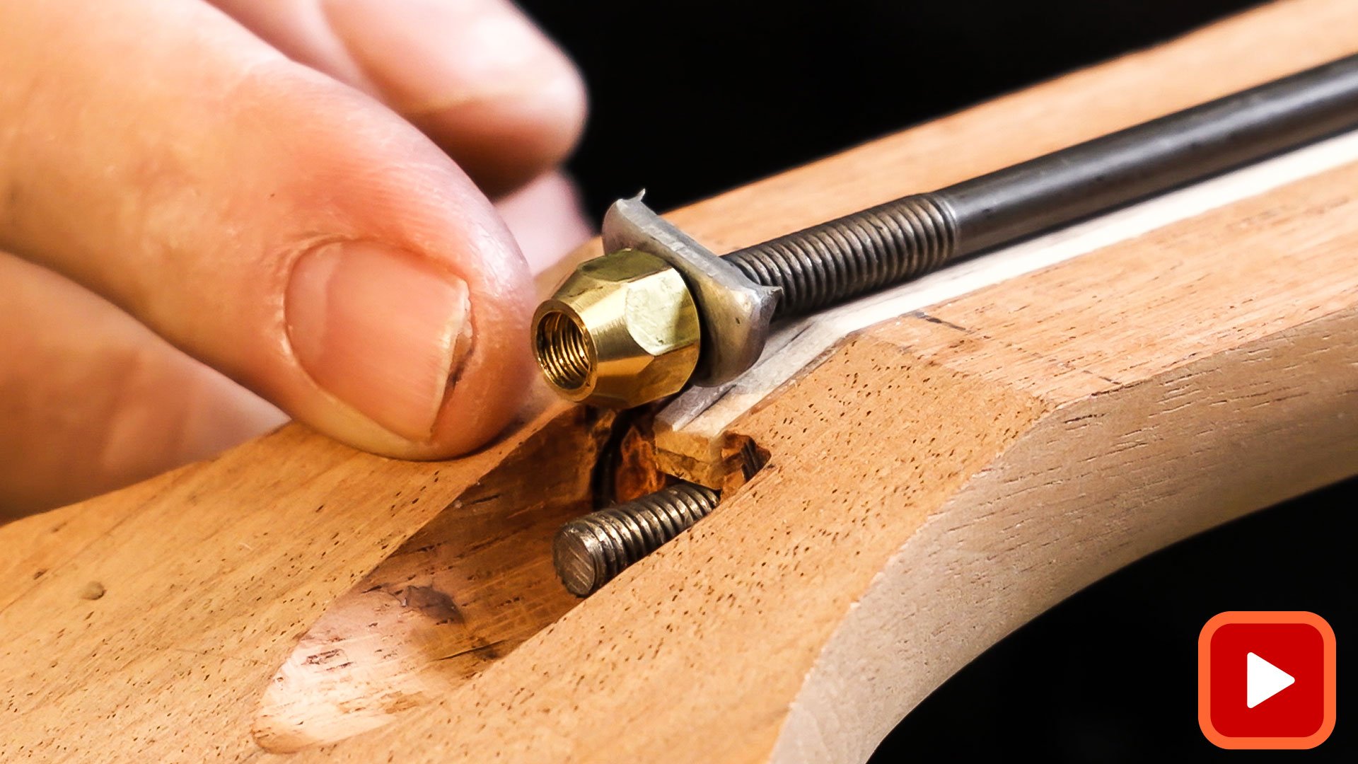 Truss rod adjustment nut and washer on neck